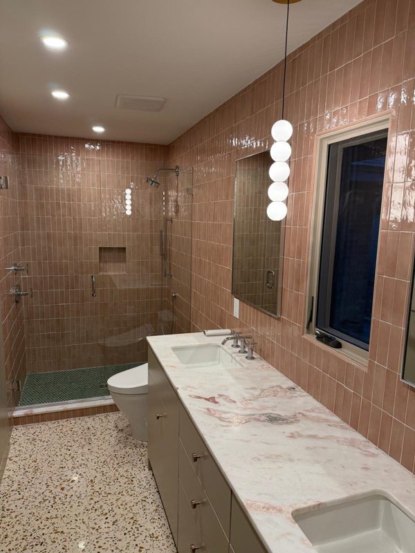 Marble-veined vanity top in a finished bath